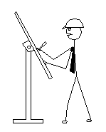 Cartoon of Engineer working at a drawing board
